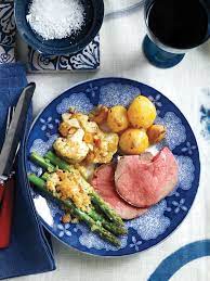 The recipes highlight the season's best produce, including rhubarb, peas, asparagus, artichokes, and carrots. An Easy Easter Dinner Menu With Roast Lamb And Spring Vegetables Martha Stewart