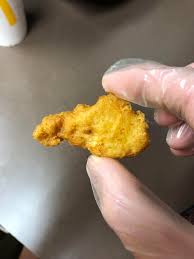 Meat slurry is added to ground chicken then shaped to nuggets or even used to make patties for chicken burger. This Kentucky Shaped Chicken Nugget Mildlyinteresting