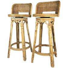 Midcentury Swivel Rattan Bamboo Bar Stool 1950s Austria At 1stdibs Designed by mermelada estudio, stool is a nod to the wicker cesta used to catch and throw the ball in the basque game of jai alai. midcentury swivel rattan bamboo bar stool 1950s austria