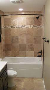 Here we see classical and contemporary modern bathroom tiles with a unique design that brightens up space. Bathroom Good Looking Brown Tiled Bath Surround For Small Bathroom Decoratoin Brown Bathroom Bathrooms Remodel Fancy Bathroom