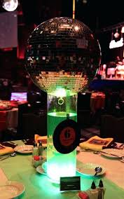 This 70s theme party was held for a 40th wedding anniversary. Examples Of Disco Theme Party Decorations 70s Party Theme Disco Ball Centerpiece Disco Theme Party