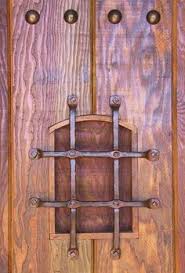 Instead of a peephole, a small speakeasy window makes it easy to see and speak to whoever is outside without opening the door. 10 Best Speakeasy Door Ideas Speakeasy Door Speakeasy Doors