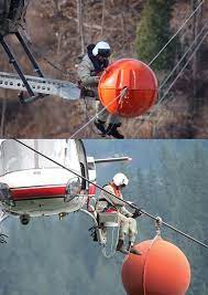 You'll often find them near mountain passes, in the deep valley areas, near major freeway crossings and around airports. What Are The Colored Aerial Marker Balls On Power Lines For