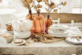We've got you covered with plenty of fall tablescape ideas. A Simple Amber Bottle Fall Tablescape Liz Marie Blog
