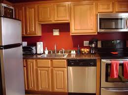 Painting oak cabinets white is the easiest way to make them look new again. Gorgeous Deep Red Orange Paint Red Kitchen Walls White Kitchen Paint Orange Kitchen Walls