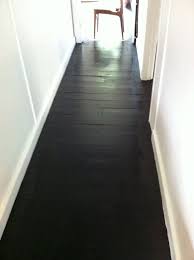 They'll just add to the charm and create a distressed look. Painted Black Floors Painted Wood Floors Black Wood Floors Painted Hardwood Floors