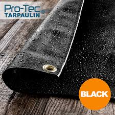 (countable) a tarp, a heavy, waterproof sheet of material, often cloth, used as a cover or blanket. 600gsm Black Coal Tarpaulin Pro Tec Garden Products