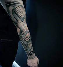 If you are a fan of half sleeve tattoos just know that you will save a lot of time and money when at a tattoo shop. 60 Music Sleeve Tattoos For Men Lyrical Ink Design Ideas