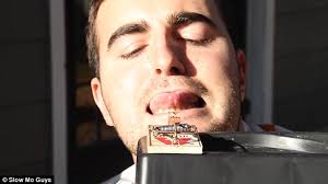 The Slow Mo Guys film a mousetrap slamming down