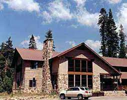 Rustic log cabin homes with crackling fireplaces. Stony Creek Lodge