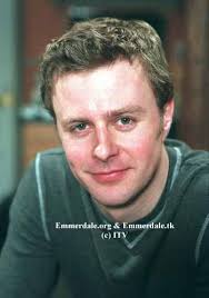 ▷ Emmerdale's Carl King played by Tom Lister