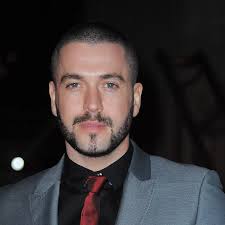 Shayne Ward sports new facial fuzz as he heads to Christie charity ball
