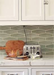 A New Take On Standard Subway Tile The Interior Collective Kitchen Backsplash Designs Kitchen Tiles Backsplash Green Backsplash