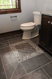 Dark Grey Tile Flooring With Dark Colors In The Accent Dark Grey Tile Grey Floor Tiles Flooring