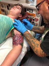 Instead of soaking your tattoo in water, cup your hands together and scoop lukewarm after you get your tattoo, your tattoo artist should apply a layer of petroleum jelly and a clear bandage over it. Aftercare Burly Fish Tattoo Piercing