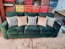 كنب قماش بحلية من الخشب