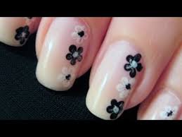 Whether done freehand with a brush or with the help of stamps, a floral effect is surprisingly easy — and always lovely. Simple Flower Nail Art Cutepolish Disney Style Youtube