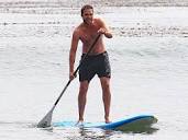 Robert Pattinson Paddle Boards in Malibu – Shirtless!