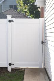 Building a diy vinyl fence saves you money. Our New White Vinyl Fence Before After The Diy Playbook White Vinyl Fence Vinyl Fence Vinyl Gates