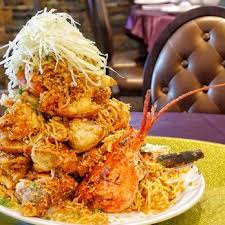 Photo Of Fishman Lobster Clubhouse Restaurant Toronto On Canada Fried Garlic And Baby Smelt Seafood Dishes Food Garlic Fries