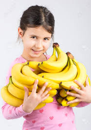 Young Girl Holding Fresh Banana Fruit Stock Photo, Picture And Royalty Free Image. Image 70344302.