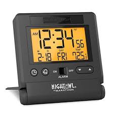 marathon atomic travel alarm clock with auto back light feature calendar and temperature folds into one compact unit for travel batteries included color bla