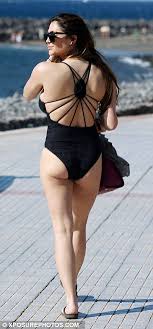 But her site also contains photographs. Casey Batchelor Flaunts Her Ample Bust In Plunging Black Swimsuit Daily Mail Online