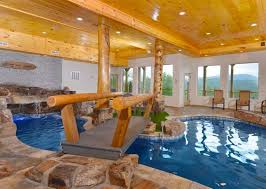 Nestled on 100 acres (40 hectares) of private land is this lovely hillside log cabin in nashville. Pigeon Forge Indoor Pool Cabins Northstar Mountain Lodge