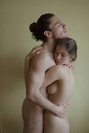 Beautiful Photo Of Naked Couple Hugging On Neutral Background.