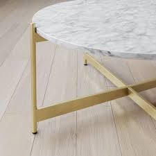 This coffee table is designed to draw attention to your space. Piper White Faux Marble Gold Brass Metal Frame Round Modern Living Room Coffee Table Nathan James
