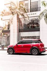 Maybe you would like to learn more about one of these? Hd Wallpaper Red 5 Door Hatchback In Front Of Burberry Building Palm Tree Wallpaper Flare