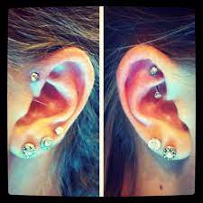 I Like How There Are Three Lobe Piercings On One Ear And Two On The Other Ear Piercings Cute Piercings Ear