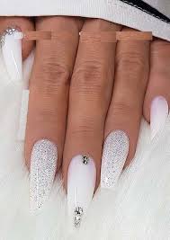 It is summertime and that means cute nails! Gorgeous White Glitter Crystals On Long Coffin Nails For 2019 Stylezco