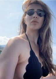 How Can Raai Laxmi Travel all the time? She is always on Yatch, Boat, Beach  in bikini with a drink? Is something fishy? : rBollyBlindsNGossip
