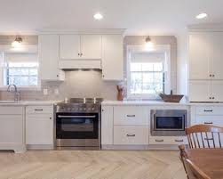 Love The Diagonal Lay Of The Hard Surface Planks In This Kitchen It Gives The Space A Totally Custom Look And Keeps It Fresh Kitchen Kitchen Cabinets Plank