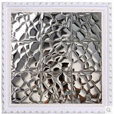 mirror silver tile backsplash kitchen