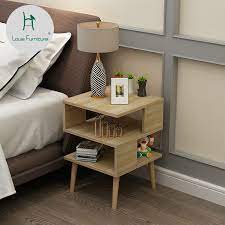 This bedside table is made of cnc cutting and bending, with polished edges and corners, and beautiful lines. Louis Fashion Nightstands Nordic Mini Modern Bedroom Mini Bedside Cabinet Simple Bedside Cupboard Tea Table Solid Wood Tall Foot Nightstands Aliexpress