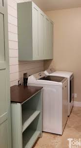 Did you just finish washing a new load of laundry? Budget Laundry Room Cabinet Plans Her Tool Belt