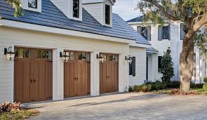 Black And White House With Wood Garage Door 9 Tres Chic Parisian Inspired Crown Molding And Trim Ideas To Copy Hunker Faux Wood Garage Door White Exterior Houses Wooden Garage Doors