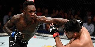 Adesanya is on the cover of a tattoo lifestyle magazine and revealed some details about his body arts. Israel Adesanya Wins Interim Title In Possible Fight Of The Year Against Kelvin Gastelum At Ufc 236 Mmaweekly Com