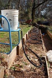 Portable Gravity Irrigator Drip Irrigation System Design Drip Irrigation Diy Garden Watering System