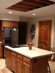 Dark cherry cabinets, uba tuba granite countertops, and neutral colored floor and wall tile. Updating An 80s Kitchen