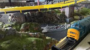 Formula cars gt and rally nascar dirt and modified drag racing monster trucks. Tony S Ho Scale Model Train Layout With Racing Track Model Railroad Layouts Plansmodel Railroad Layouts Plans