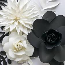 Elegant And Bold This Monochrome Paper Flower Display Is Sure To Make A Statement Perfectly Add A T White Paper Flowers Paper Flowers Paper Flower Wall Decor