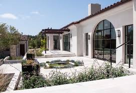 Crafted from metal, this fixture features a round canopy, an adjustable hanging method, and a curved cap in a versatile solid finish. Check Out This Image From The Urban Electric Co Spanish Style Homes Spanish House Modern Spanish Home