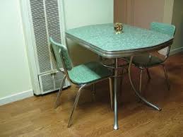 The classic chrome 1950s kitchen table typically featured a formica or laminate top. 7 1950 S Tables Ideas Vintage Kitchen Table Formica Table Retro Kitchen