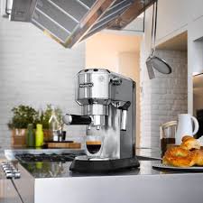 The coffee maker also steams milk for cafe drinks and has a handy cup warmer. Delonghi Dedica Espresso And Cappuccino Machine Ares Kitchen And Baking Supplies