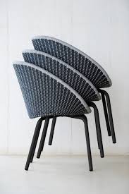 Stackable Outdoor Dining Chair From Cane Line The Peacock With Weaved Bucket Seat On Slim Aluminium Woven Dining Chairs Outdoor Dining Chairs Outdoor Chairs