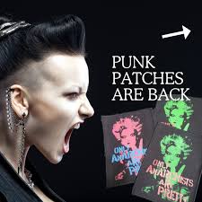 My style at the moment seems to be 'boho punk'. Is there such a thing?  Today I've been playing around with ONLY ANARCHISTS ARE PRETTY patches.  Upcycled a sparkly cardigan for myself