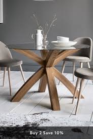Extendable round dining room table modern solid wood medium brown. Dining Tables Round Rectangular Dining Tables Next